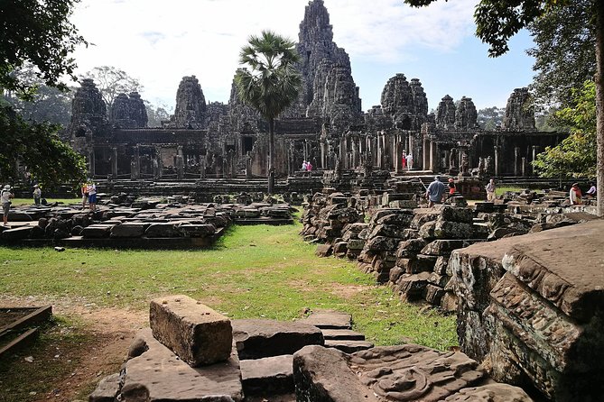 1-Day Amazing Angkor Wat Tour with Sunset & All Interesting Major Temples - Angkor Thom, Bayon, and the stone faces