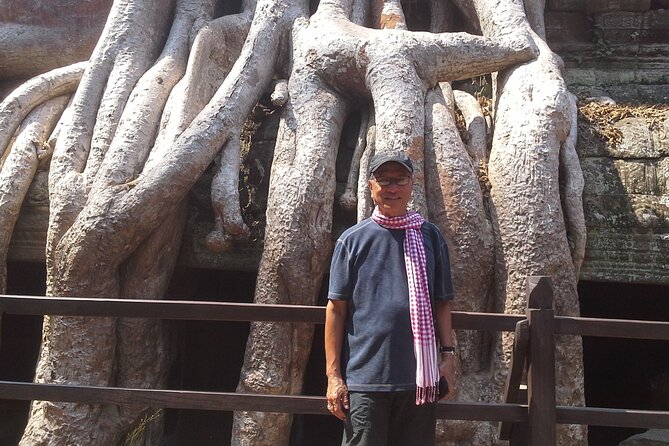 1-Day private Angkor Temple Tour with Sun Rise by Tuk Tuk from Siem Reap - Crossing into Angkor Thom through the South Gate