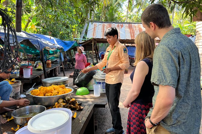 2-Day Angkor Wat and Banteay Srei with Countryside Exploration - Ta Prohm and the famous tree roots