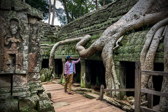 2 Day Angkor Wat Kulen Mountain Beng Mealea Floating Village Tour - Angkor Thom and the Bayon faces