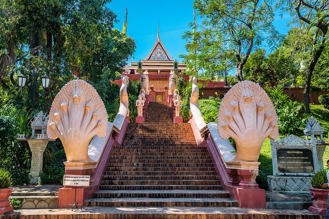 3-Day Private Tour Phnom Penh & Siem Reap include domestic flight - Ta Prohm, where stone and trees meet