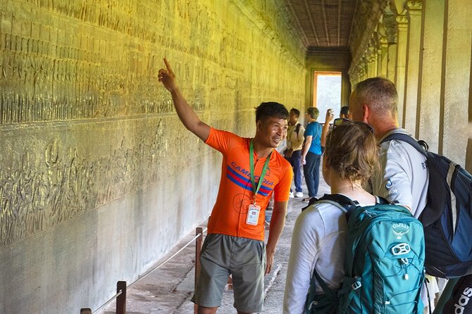 Angkor Sunrise Bike Tour - Breakfast & Lunch included - South Gate of Angkor Thom and the stone faces of Bayon