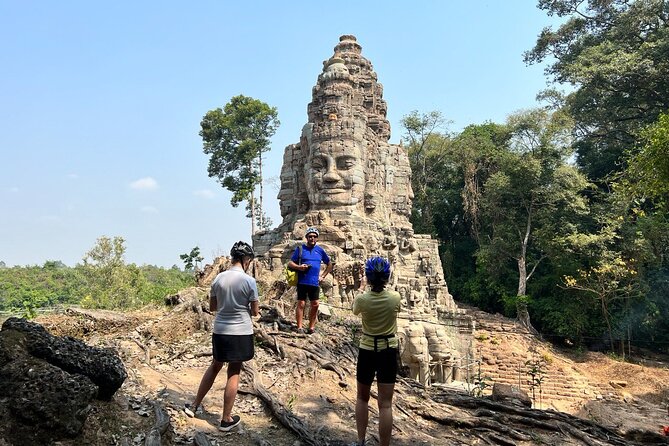 Angkor Sunrise Bike Tour with Lunch Included - Starting before dawn at Angkor Wat
