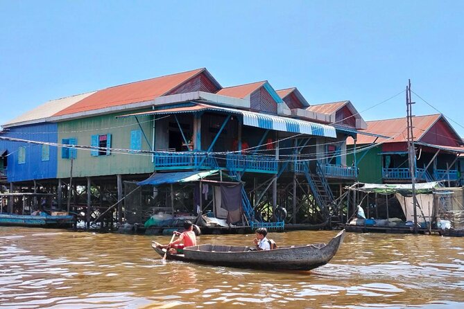 Angkor Sunrise & Floating Village Sunset Full-Day Siem Reap Tour - Bayon’s many stone faces