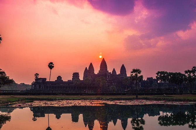Angkor Sunrise Half-Day Tour with Private Vehicles & Tour Guide - Bayon Temple: a one-hour stop among stone faces