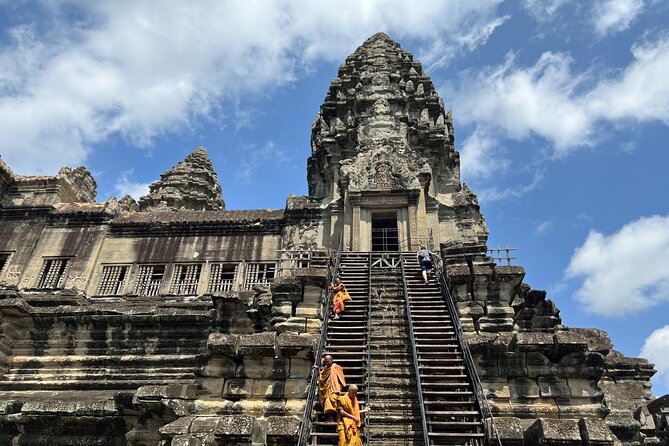Angkor Wat Bike Tour with Lunch Included - Bayon and the stone faces of Angkor Thom