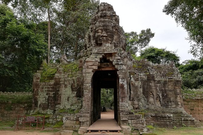 Angkor Wat Private Driver Tours to Angkor Wat Sunrise, Angkor Thom & Ta Prohm - Angkor Thom and the Bayon’s stone faces