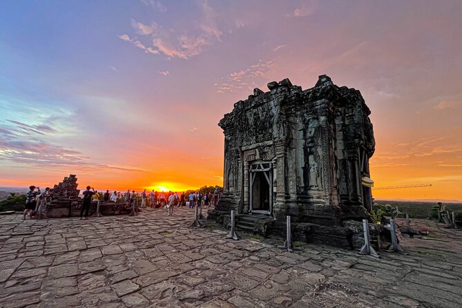 Angkor Wat Small Group Tour and Sunset with Lunch Included - Bayon’s smiling faces reward a slow look
