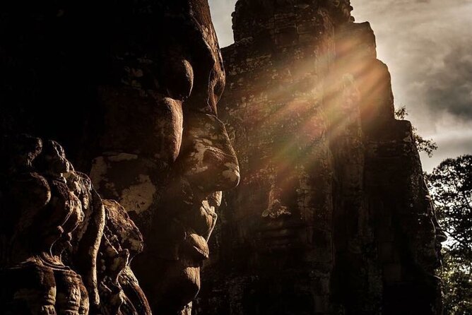 Angkor Wat Sunrise & 3 Main Temples with Breakfast – Small Group - Bayon and the stone faces of Lokeśvara