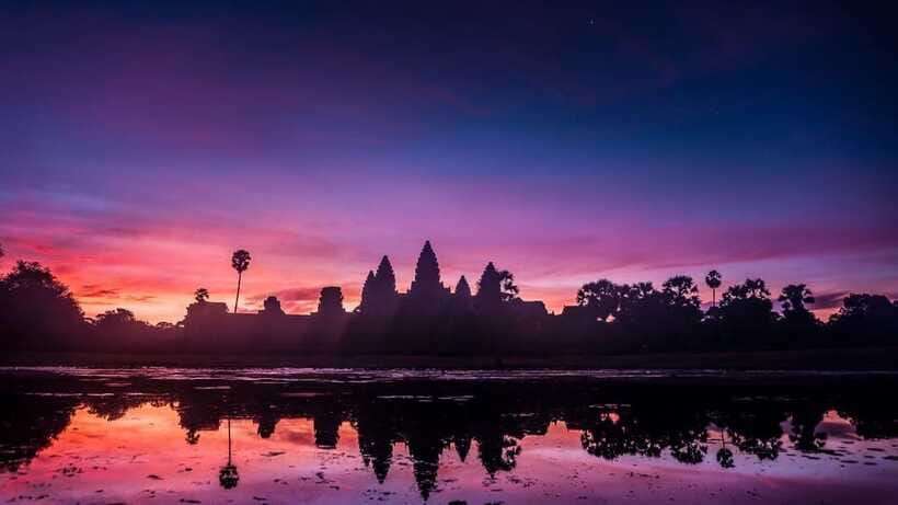 Angkor Wat: Sunrise: Ta Prohm and Bayon Temple Tour - Angkor Thom and Bayon’s stone faces