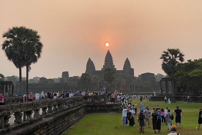 Angkor Wat Sunrise Tour & Archaeological Park Exploration - Bayon’s carved faces and central location