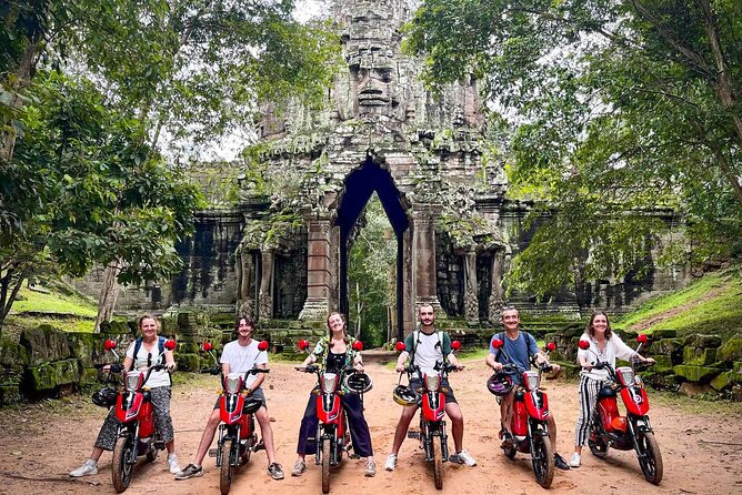 Angkor Wat Sunrise Tour By E-Bike Experience With Breakfast Included - Ta Prohm, where trees take over the temple