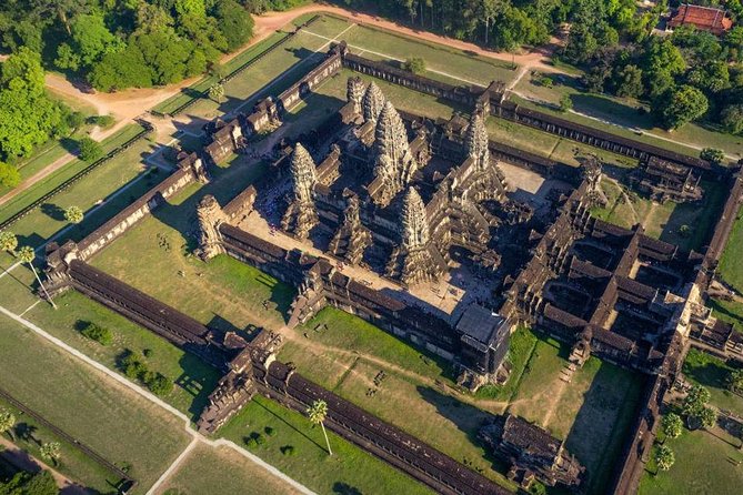 Angkor Wat Sunset Tour - Ta Prohm and the trees over the stones