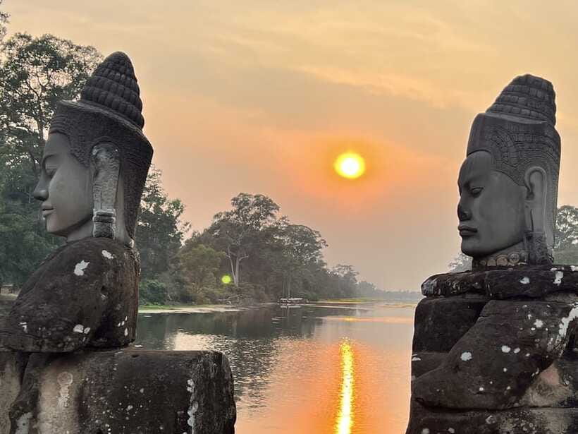 Explore Angkor Wat by Bike and Sunset - Bayon’s stone faces and Angkor Thom