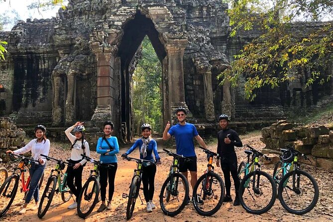 Full-Day Bike Tour in Siem Reap with Zipline - Baray Jayataka and the traditional canoe