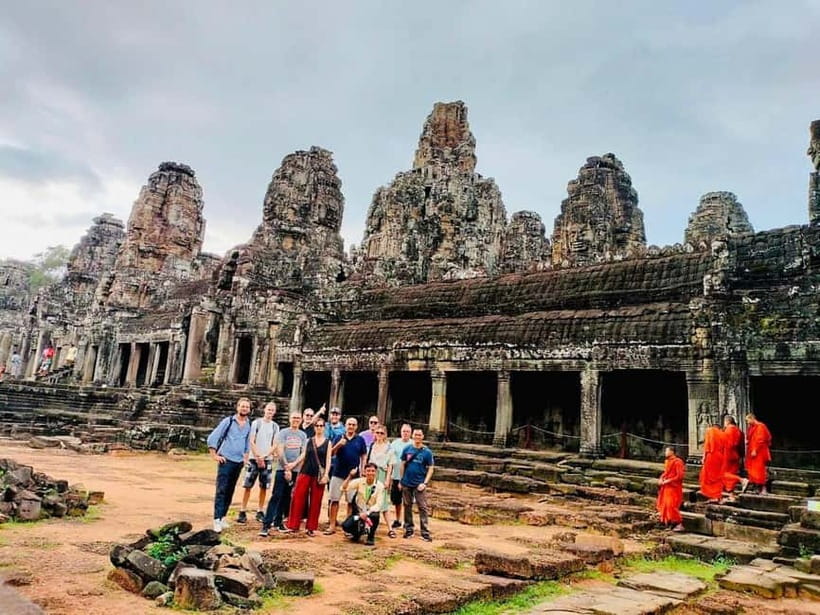 Full-Day Explore Angkor Temples Sunset Tour (with Lunch) - Bayon’s stone faces and daily Khmer life