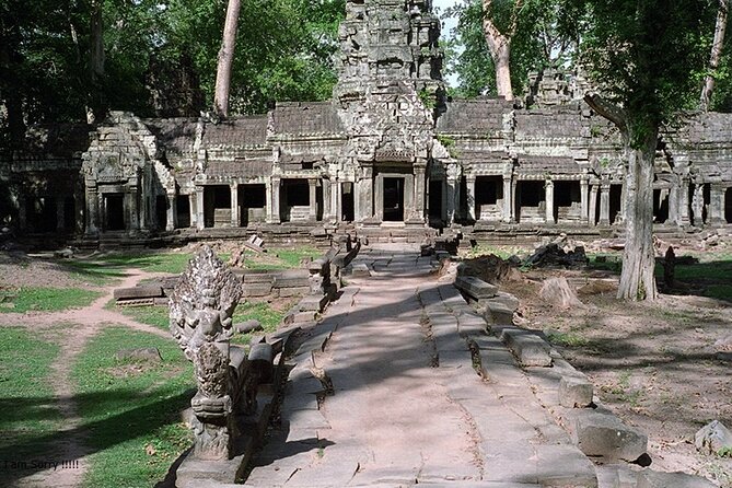 Half-Day Ta Prohm and Banteay Kdei Tour - Ta Prohm, where trees take over the temple