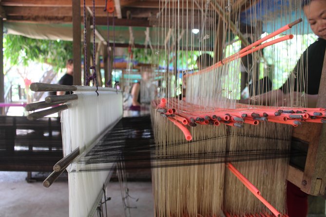 Island Community Life in Phnom Penh - Watching silk being made by hand
