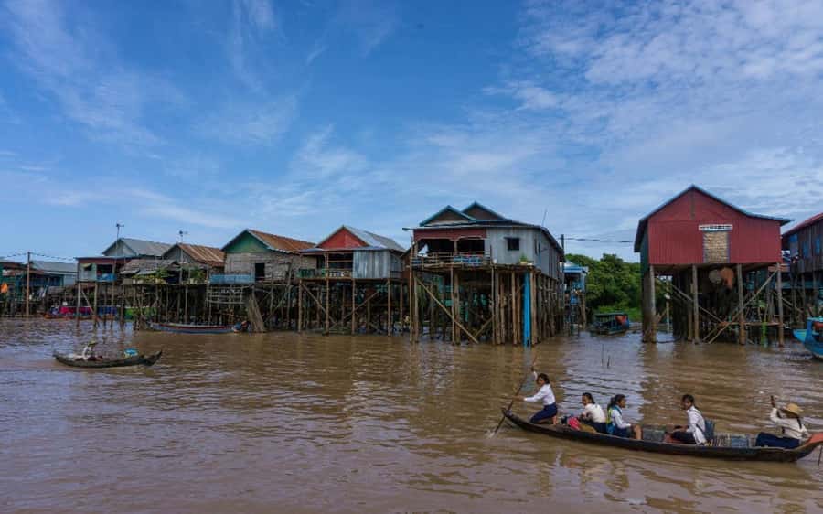 Kompong Pluk Tour - A pagoda or market before the boat