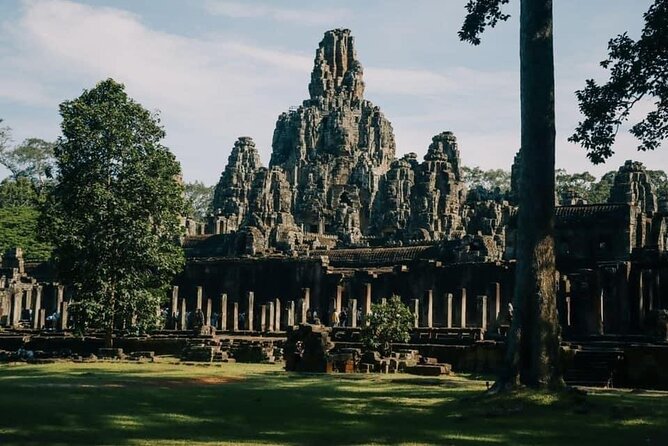 One Full Day Private tour of Angkor Wat, Ta Prohm, Angkor Thom & Banteay Srie - Ta Prohm, where the jungle takes back the stone
