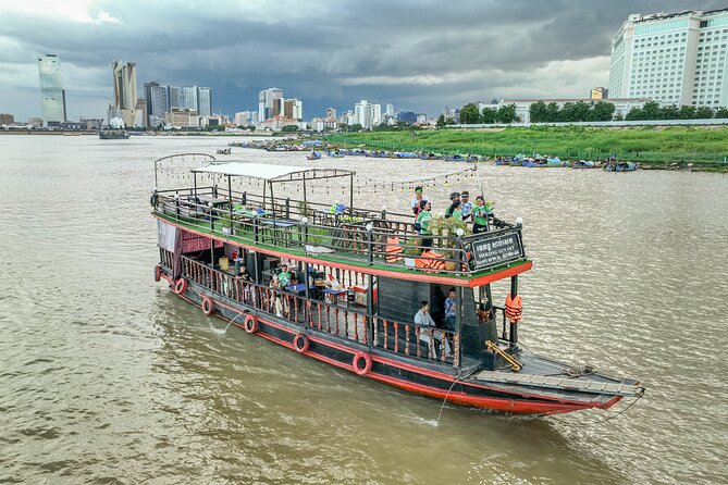Phnom Penh Bike & Boat Sunset Tour / E-Bike Available - A sunset cruise with drinks and small bites