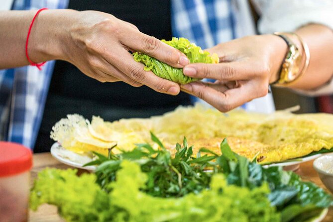 Phnom Penh Morning Market & Food Tour by Tuktuk - Includes All Food & Drinks! - Turmeric crepes with a Cambodian character