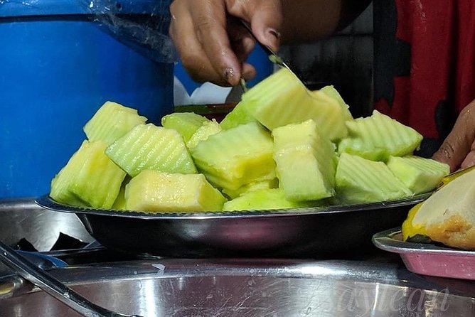 Phnom Penh Nightlife Street Food Tours - Kandal Market: grilled food near the river