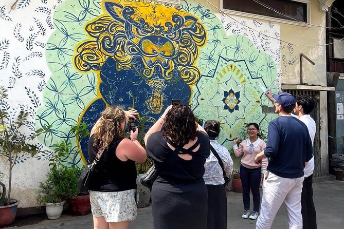 Phnom Penh's Morning Market and Street Art Tour by Tuk tuk - Riding into Boeung Kak 1 for the murals