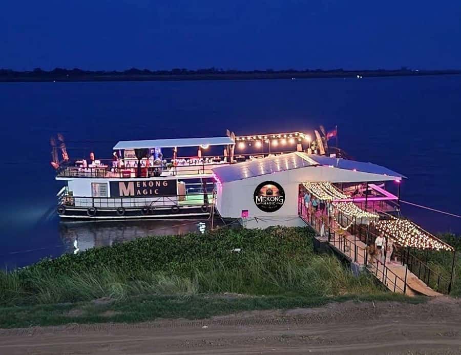 Phnom Penh: Sunset Cruise with Unlimited Beers & BBQ Buffet - When the sun disappears and Phnom Penh lights up