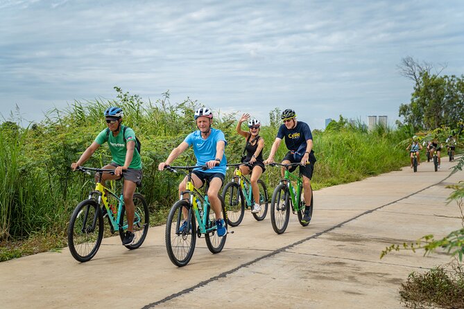 Phnom Penh to Silk Island Sunset Bike Tour/ E-Bike or Tuk Tuk - Sunset by the river with snacks and a drink