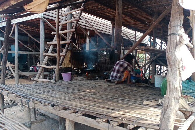 Private Half-Day Tour to Kampong Phluk Flooded Forest and Floating Villages - Inside a village built above the water