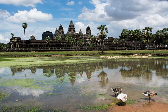 Private Sunrise Angkor Wat Tour with pickup from your hotel - Bayon: a temple of stone faces