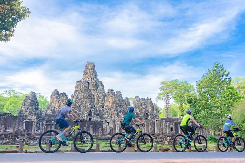 Siem Reap: Angkor Sunset Bike & Boat Tour /E-Bike Available - Entering Angkor by trails instead of traffic