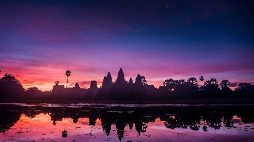 Siem Reap: Angkor Wat, Bayon & Ta Prohm Guided Tour - Ta Prohm: trees, broken walls, and a slower pace