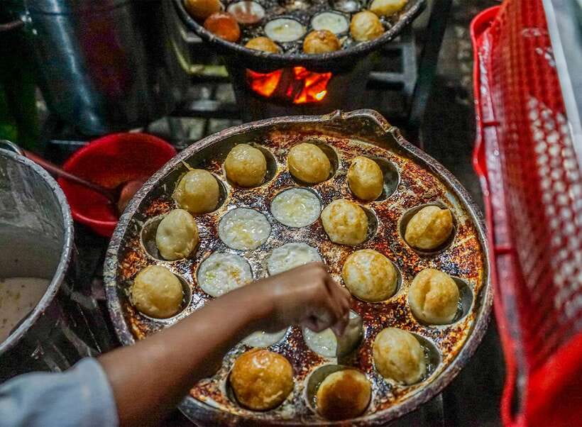 Siem Reap: Evening Food Tour with 10 Local Tastings - 7:00 pm, fruit, rolls, tofu, and barbecued snails