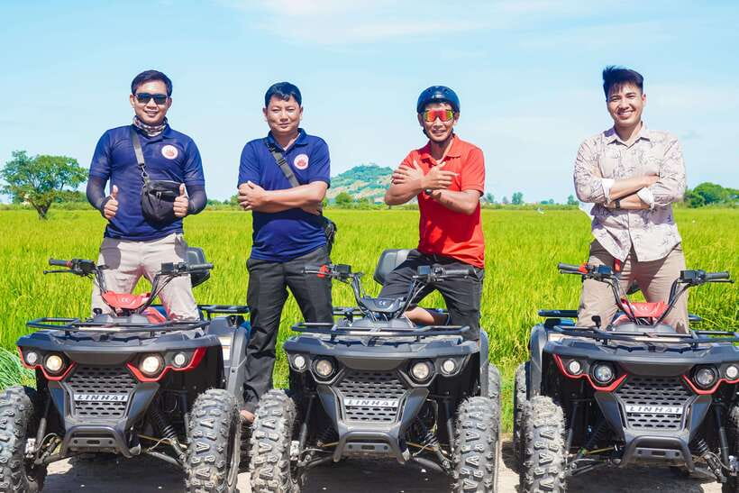 Siem Reap: Khmer Village and Fish Farm ATV Tour - Rice fields, farm work, and open views