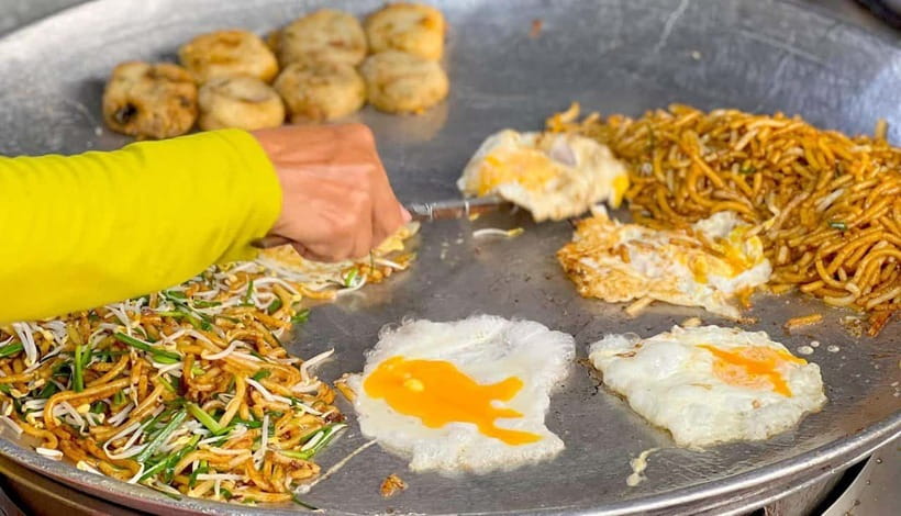 Siem Reap: Street Food Experience by Tuk-Tuk - Street 60 brings the adventurous plate