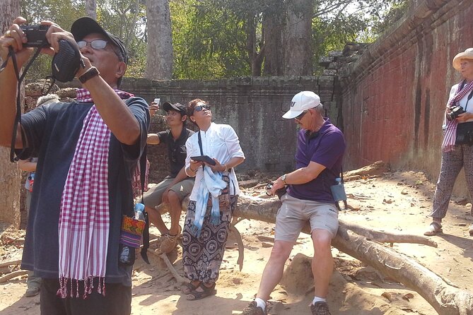 Sun Rise at Angkor Wat Small Group Day Tour from Siem Reap - Entering Angkor Thom through the South Gate