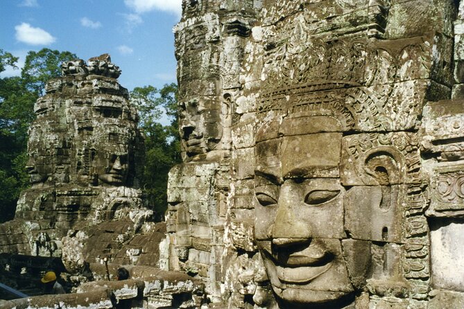Sun Rise at Angkor Wat Small Group Day Tour from Siem Reap - Bayon and its many stone faces