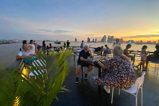 Sunset Cruise with free flow beer, soft drinks & fruit platter - Royal Palace views from the river
