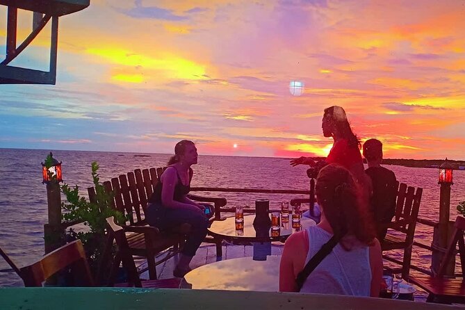 Sunset Dinner and drinks includes a Floating Village cruise tour. - A quick stop at a Siem Reap lotus farm