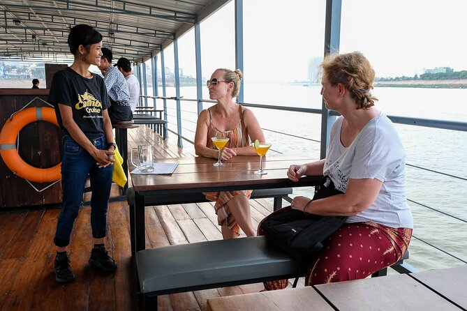 Sunset & Evening Dinner Cruise With One Way Free Pick Up - Pass the Royal Palace with the city behind you