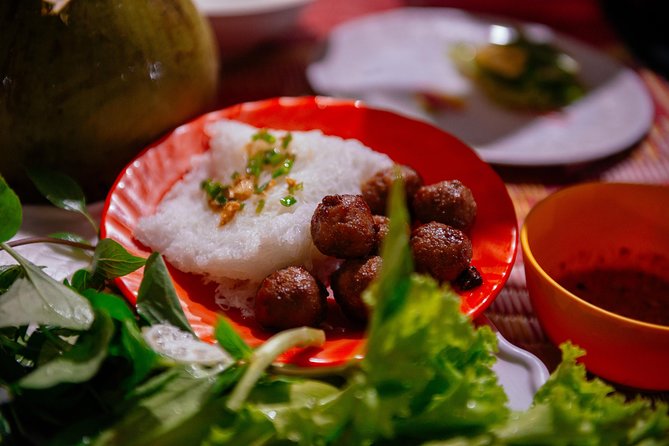The 10 Tastings of Siem Reap With Locals: Private Street Food Tour - Kandal Village: fish curry and a crisp fried bite