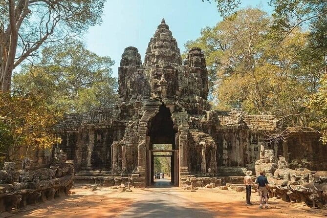 Two Day Tour, Taxi Phnom Penh to Siem Reap, Angkor Visit & Return - Angkor Thom and the face towers of Bayon