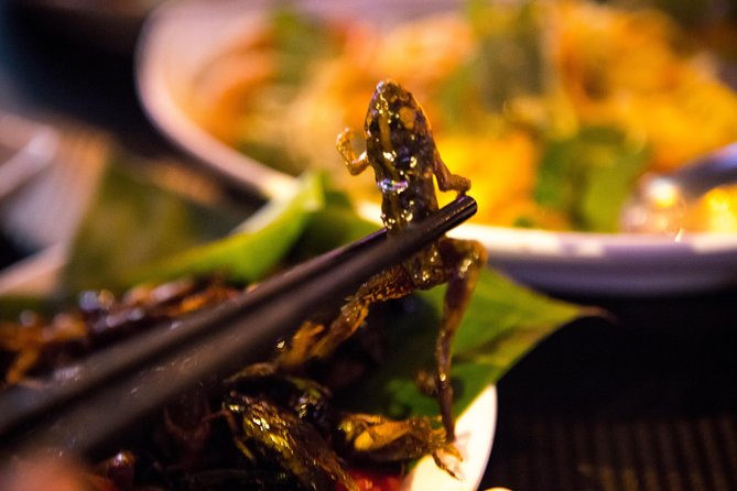 Ultimate Phnom Penh Food Tour by Tuk Tuk: 20 Tastings and Drinks - Stop one: an old dish near the Royal Palace