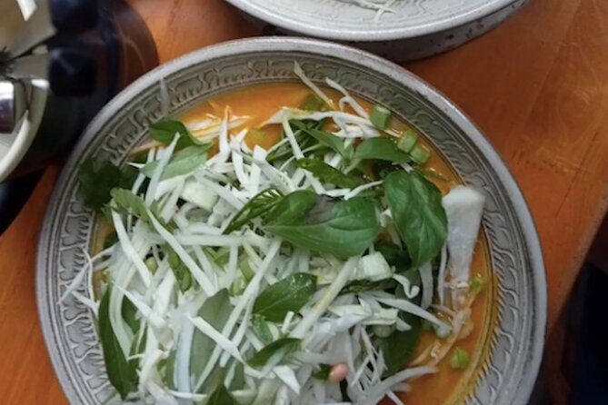 Ultimate Phnom Penh Food Tour by Tuk Tuk: 20 Tastings and Drinks - Stop two: family cooking by Wat Botum Park