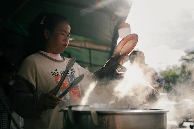 Ultimate Siem Reap Food Tour by Tuk Tuk - 20 Tastings, 8 Stops - Stop 2: Tropical fruit and unusual street food near Angkor Wat