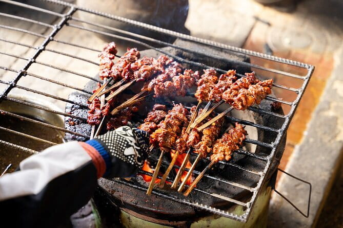 Ultimate Siem Reap Food Tour by Tuk Tuk - 20 Tastings, 8 Stops - Stop 1: Wat Damnak starts with a snack and beer